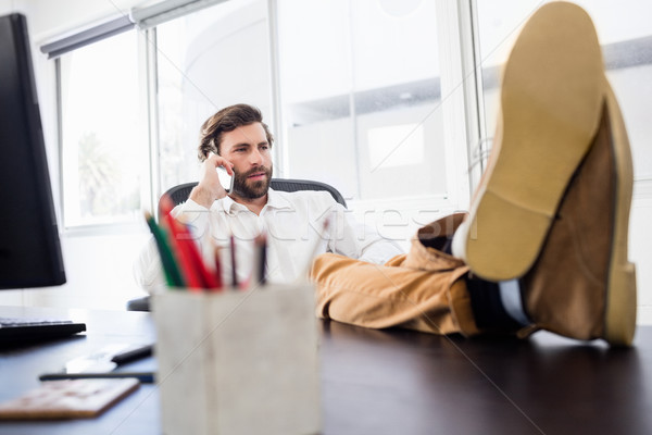 Stockfoto: Man · roepen · kantoor · ontspannen · telefoon · gelukkig