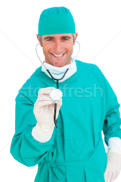 Karizmatikus sebész tart sztetoszkóp fehér kezek Stock fotó © wavebreak_media