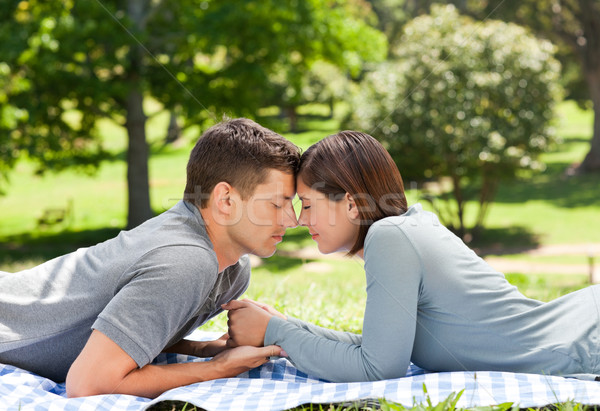 Enamored couple in the park  Stock photo © wavebreak_media