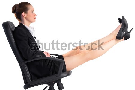 Businesswoman sitting on swivel chair with feet up Stock photo © wavebreak_media