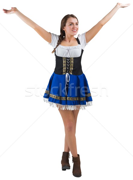 Stock photo: Pretty oktoberfest girl smiling with arms raised