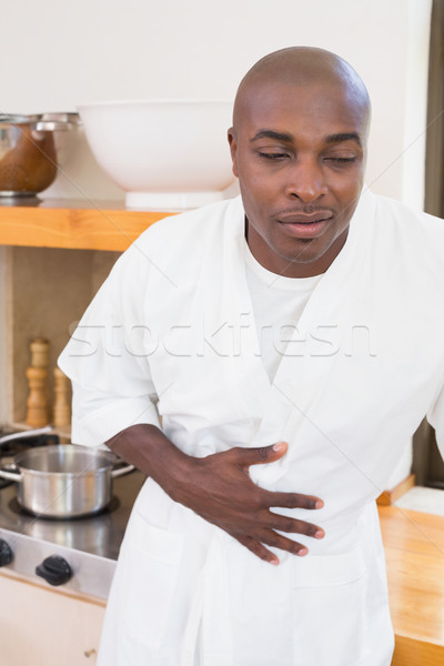 Ziek man badjas maag home keuken Stockfoto © wavebreak_media