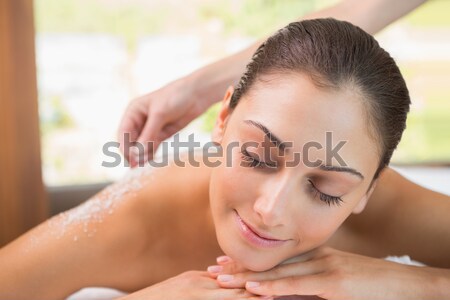 Stock photo: Beautiful young woman on massage table