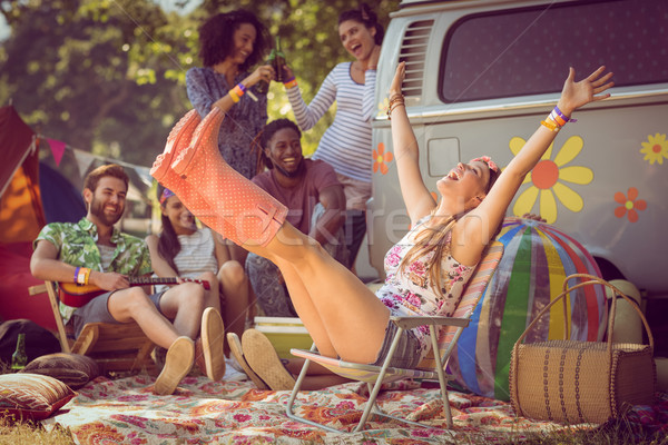 Carefree hipster having fun on campsite Stock photo © wavebreak_media
