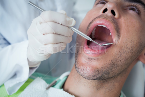 Uomo denti dentista strumento maschio Foto d'archivio © wavebreak_media