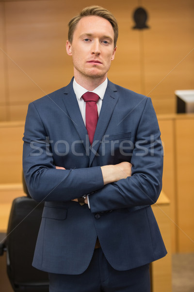 Serious lawyer looking at camera Stock photo © wavebreak_media