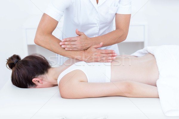 Physiotherapist doing back massage  Stock photo © wavebreak_media
