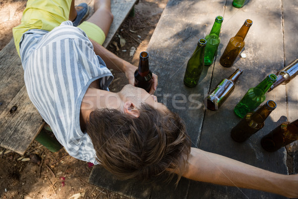 無意識 男子 長凳 公園 醉 啤酒 商業照片 © wavebreak_media
