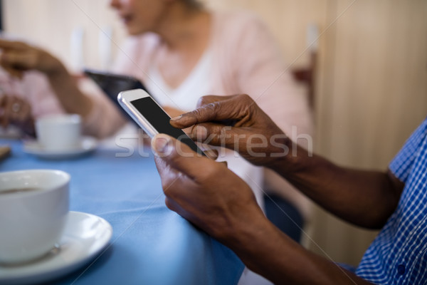 Afbeelding senior man mobiele telefoon vergadering vriend Stockfoto © wavebreak_media