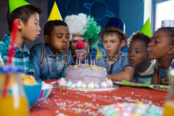 Enfants clown bougies gâteau fête [[stock_photo]] © wavebreak_media