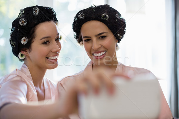 Bride taking selfie with her friend Stock photo © wavebreak_media