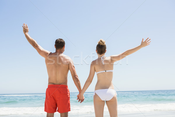 Foto stock: Casal · de · mãos · dadas · praia · mulher · amor