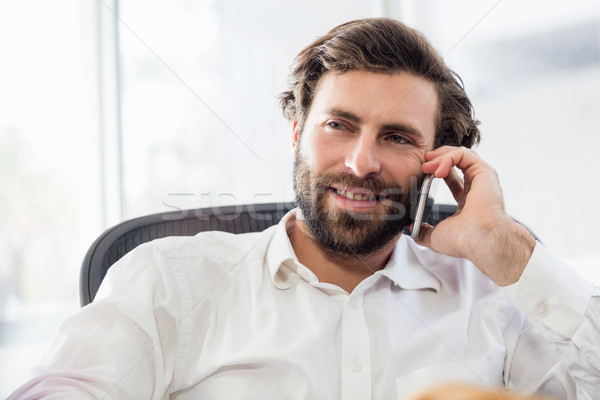 Lächelnd Mann rufen Büro Business Computer Stock foto © wavebreak_media