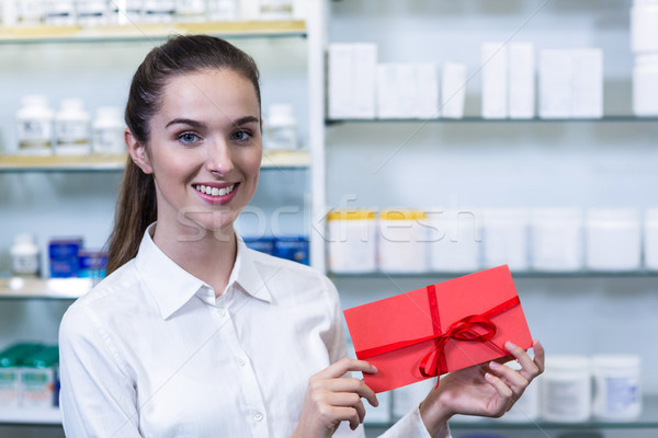 Uśmiechnięty farmaceuta obecnej apteki portret Zdjęcia stock © wavebreak_media