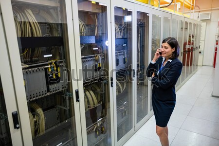 Technician using laptop while analyzing server Stock photo © wavebreak_media