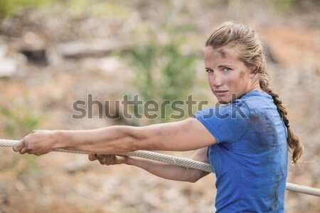 Man playing tug of war during obstacle course Stock photo © wavebreak_media