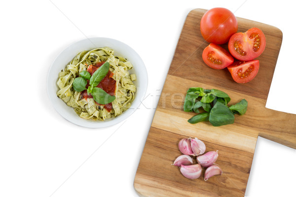 High angle view of vegetables on cutting board by pasta Stock photo © wavebreak_media