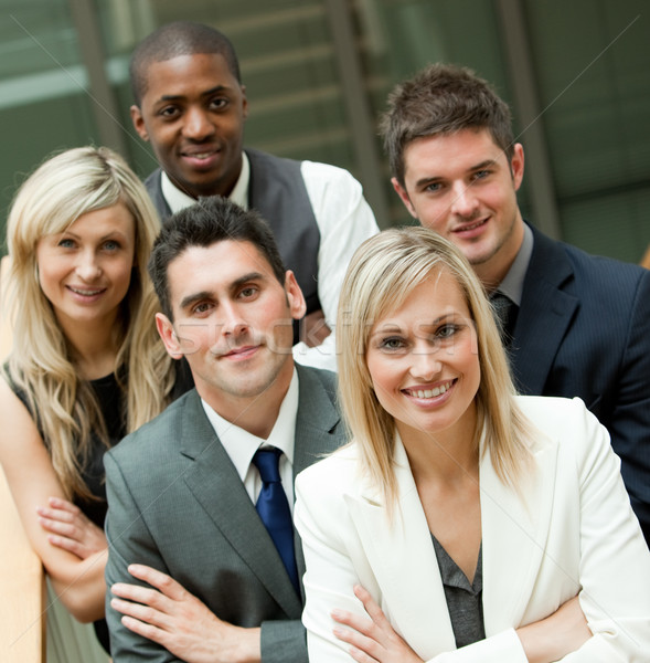 Businesspeople with a blon woman in the middle in an office Stock photo © wavebreak_media