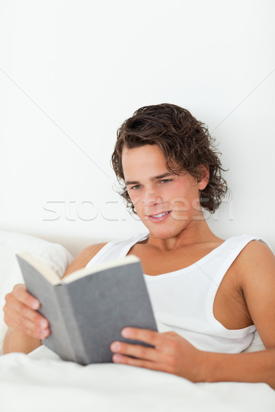 [[stock_photo]]: Portrait · homme · lecture · livre · chambre · maison