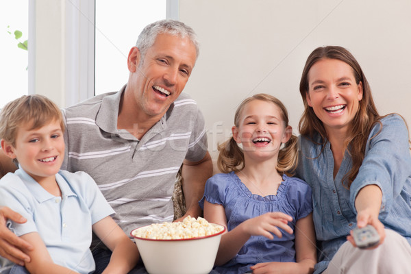 Famille regarder film salon alimentaire amour [[stock_photo]] © wavebreak_media