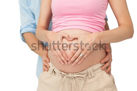 Expectant parents embracing Stock photo © wavebreak_media