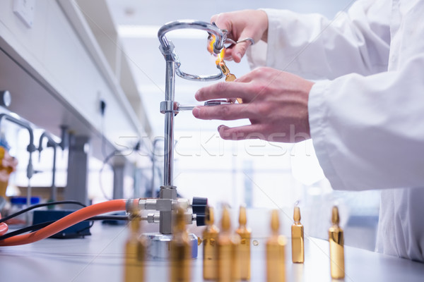 Close up of a biochemist sealing a vial Stock photo © wavebreak_media