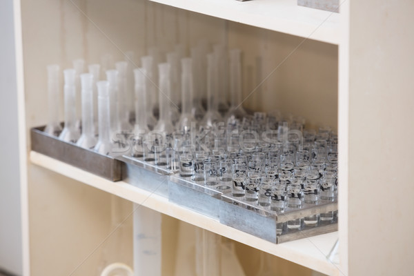 Stock photo: Tray with test tubes at the shelf