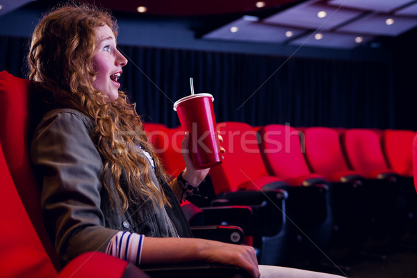 Young woman watching a film Stock photo © wavebreak_media