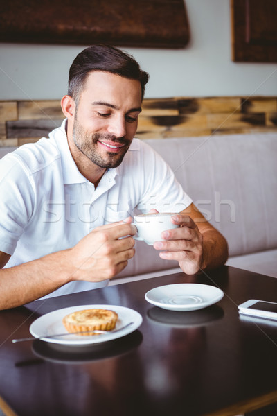 Genç içme fincan kahve pasta Stok fotoğraf © wavebreak_media