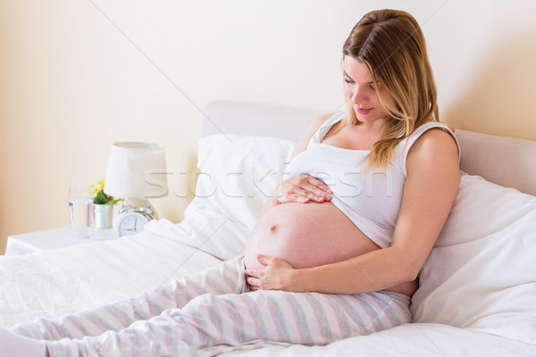 Hamile kadın bakıyor göbek ev ev mutlu Stok fotoğraf © wavebreak_media