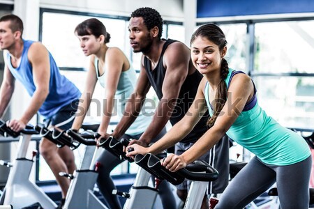 Fit people working out at spinning class Stock photo © wavebreak_media