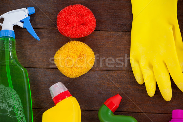 Various cleaning equipment arranged on wooden floor Stock photo © wavebreak_media