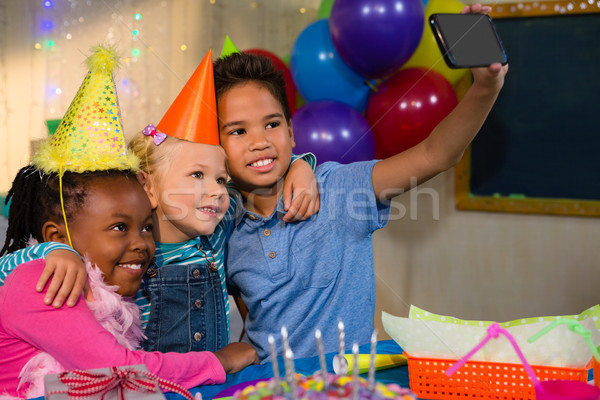 Kinder sprechen Handy Geburtstagsparty Mädchen Party Stock foto © wavebreak_media