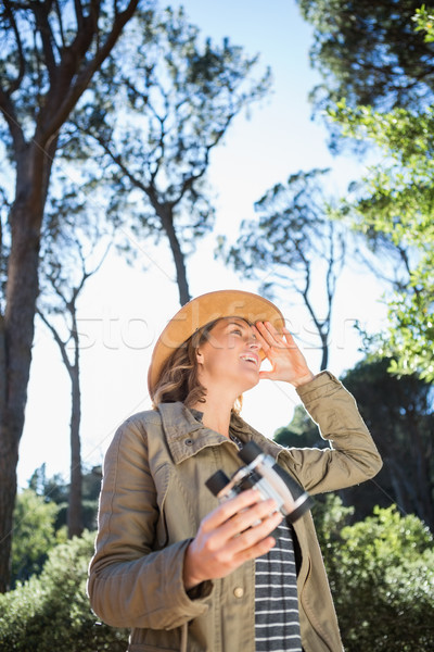 Woman using binoculars Stock photo © wavebreak_media