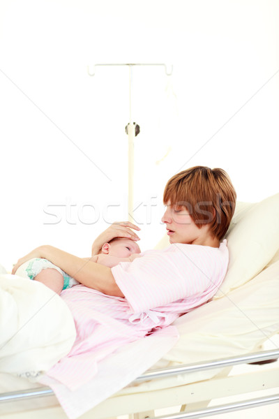 Mother embracing her newborn baby Stock photo © wavebreak_media