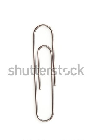 Close up of a grey paperclip on the floor against a white background Stock photo © wavebreak_media