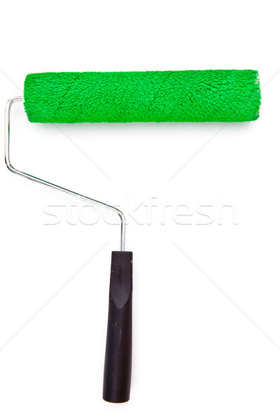 Green paint roller on white background Stock photo © wavebreak_media