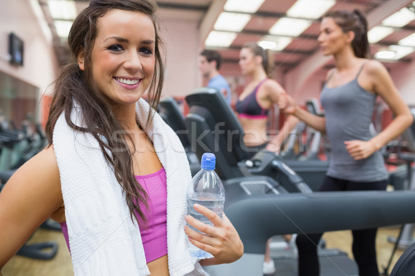 Woman happy in the gym after exercise on the treadmill Stock photo © wavebreak_media