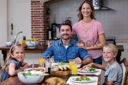 Aile gülen yemek masası mutfak kadın çocuk Stok fotoğraf © wavebreak_media