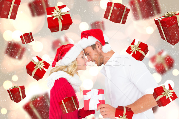 Composite image of young festive couple Stock photo © wavebreak_media