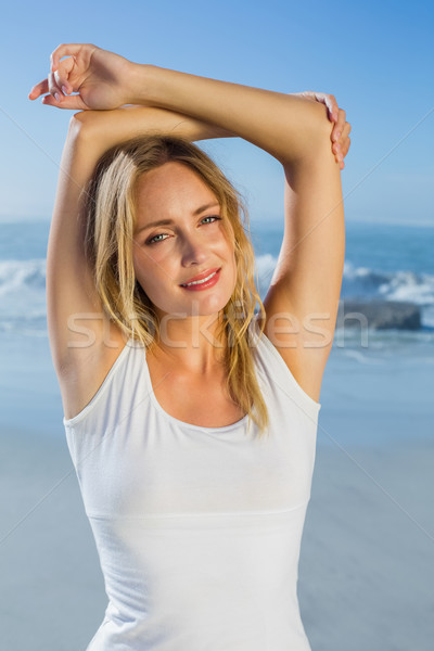 Сток-фото: великолепный · счастливым · блондинка · позируют · пляж