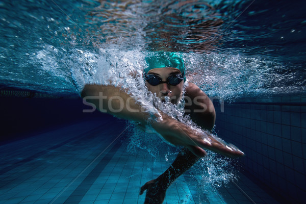 Fit swimmer training by himself Stock photo © wavebreak_media