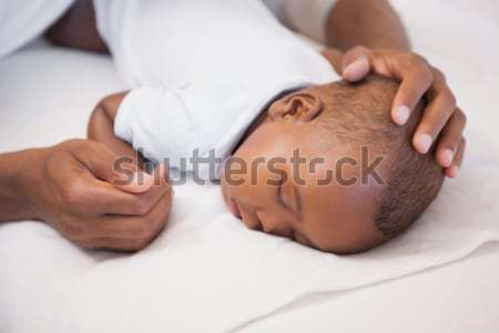 Bebé nino dormir sofá padre casa Foto stock © wavebreak_media