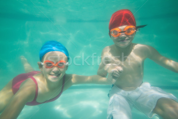 Cute дети позируют подводного бассейна отдыха Сток-фото © wavebreak_media