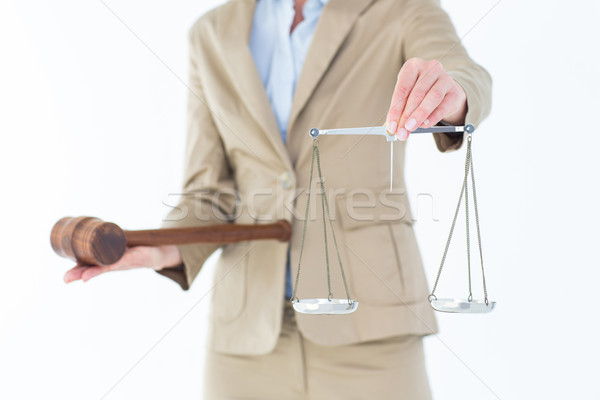 Young woman holding scales of justice and a gavel  Stock photo © wavebreak_media