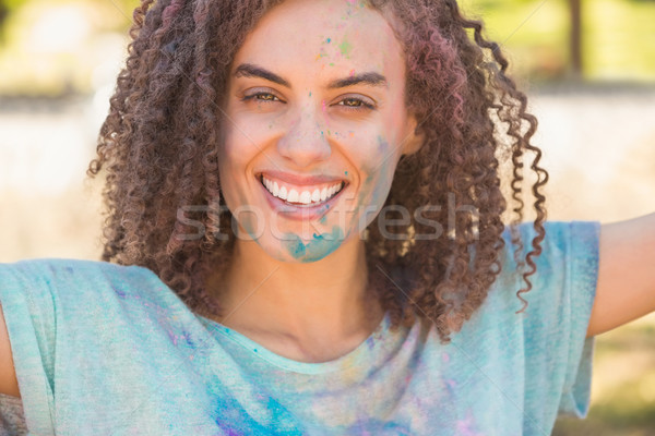 Genç kadın toz boya çim Stok fotoğraf © wavebreak_media