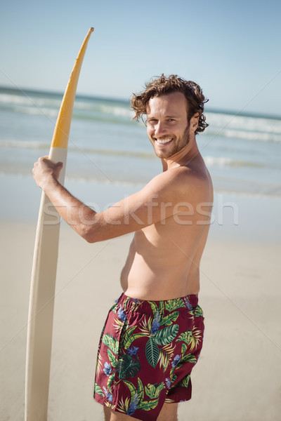 Retrato feliz sem camisa homem prancha de surfe Foto stock © wavebreak_media