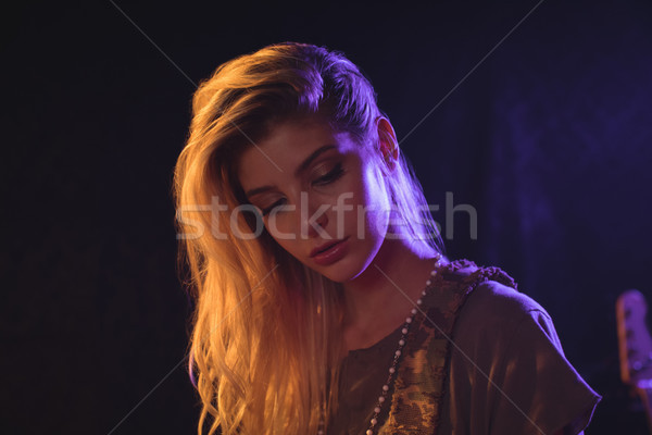 Beautiful female musician in nightclub Stock photo © wavebreak_media