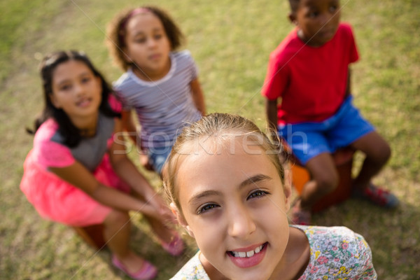 High angle view of children sitting in yard Stock photo © wavebreak_media
