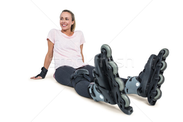 Cheerful female inline skater relaxing Stock photo © wavebreak_media